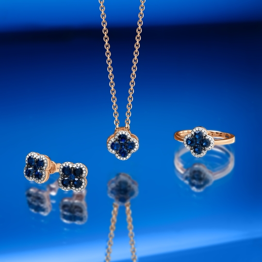 Кольцо из золота с бриллиантами и корундом сапфировым