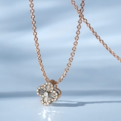 Подвеска из комбинированного золота с бриллиантами