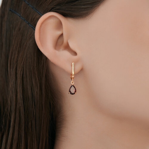 Кольцо из серебра с позолотой и гранатом