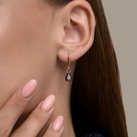 Кольцо из серебра с позолотой и гранатом