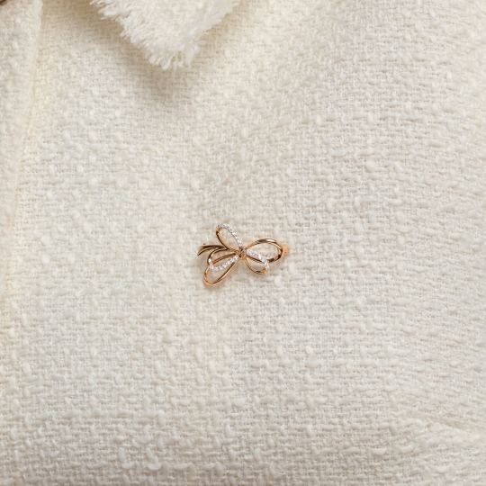 Брошь из золота с гранатом и топазами