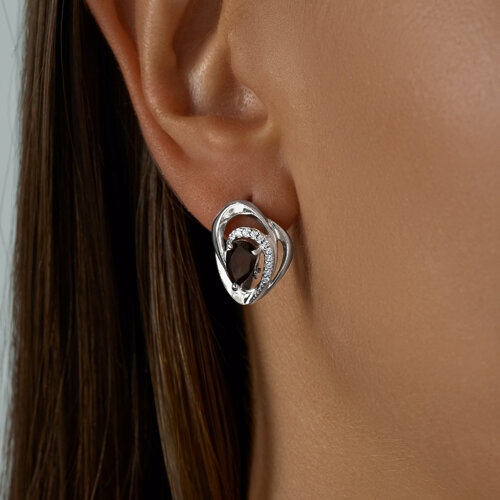 Кольцо из серебра с гранатом и фианитами