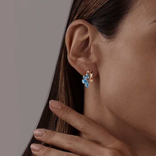 Кольцо из золота с топазами